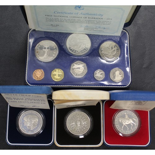 311 - UK & World proof coins including silver issues and comprising 1973 Barbados 8-coin proof set wit... 