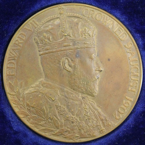 23 - 1902 Edward VI coronation medal in bronze. A couple of surface spots otherwise much as issued. In or... 