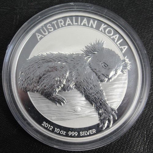 293 - Australia, 2012 10oz silver Koala $10. A few minor surface marks, aUNC. Complete with original capsu... 