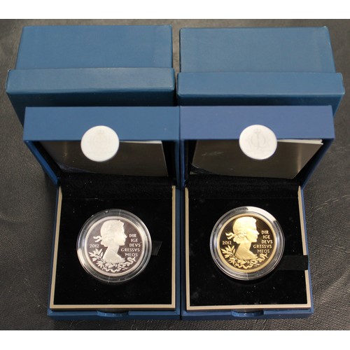 248 - A pair of 2012 Official silver proof £5 coins including standard proof and gold plated issues. Struc... 