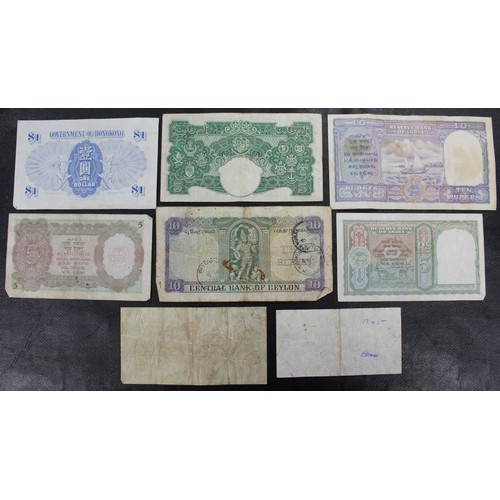 1 - A selection world banknotes (8) comprised of Commonwealth/Territory issues of George VI from Ceylon,... 