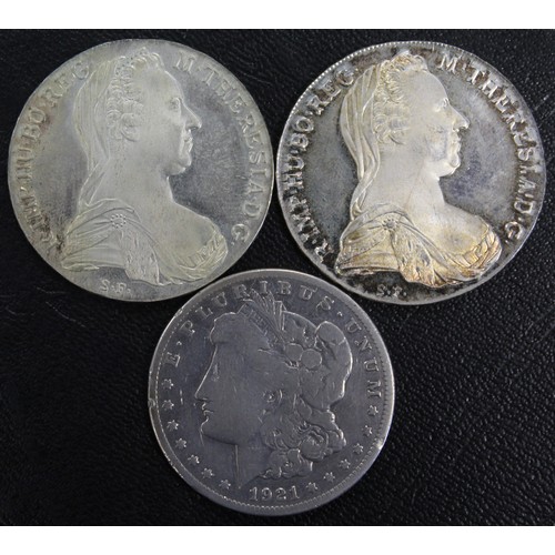 308 - A trio of world coins including two Maria Theresa 1780-X thaler restrikes and a 1921-S Morgan dollar... 