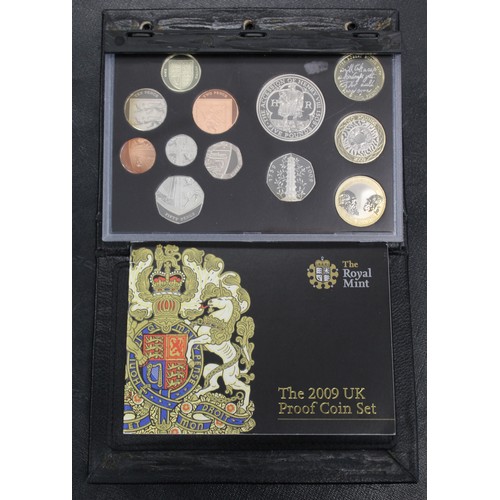 266 - 2009 12-coin proof set with Kew Gardens 50p. Presented in black leather case of issue (the glue requ... 