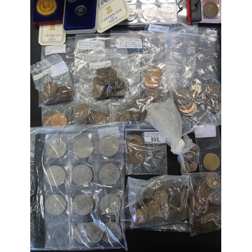 325A - A single estate collection of coins and medals to include a set of £2 coins (10), Isle of Man ... 