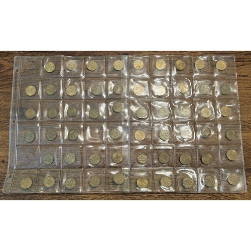 131 - Two album pages of brass threepence to include one full date run with 1946 & 1949 issues. Genera... 