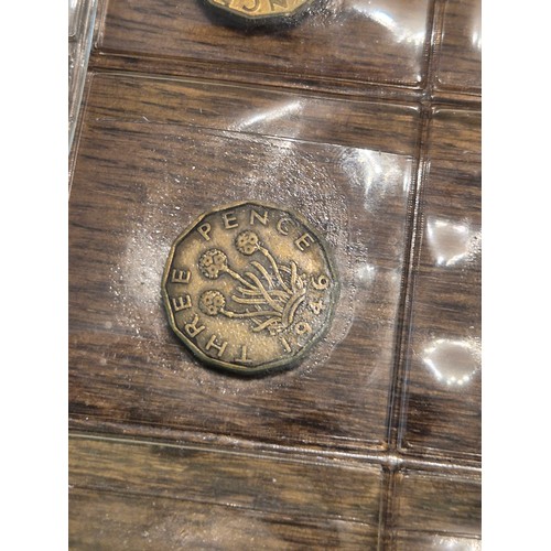 131 - Two album pages of brass threepence to include one full date run with 1946 & 1949 issues. Genera... 