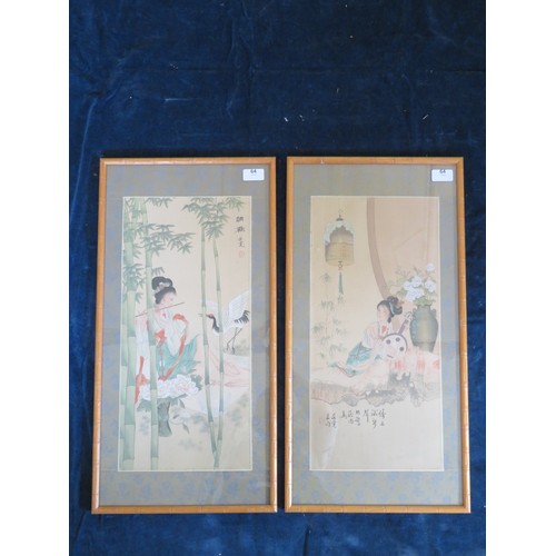 64 - A pair of mid 20th century Japanese prints in bamboo style frames depicting 