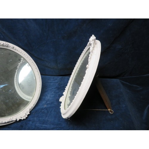 183 - 2 oval dressing table mirrors with rose and swag decoration