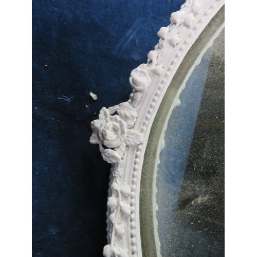 183 - 2 oval dressing table mirrors with rose and swag decoration