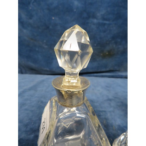 231 - A cut glass scent bottle of square section being 7 1/2