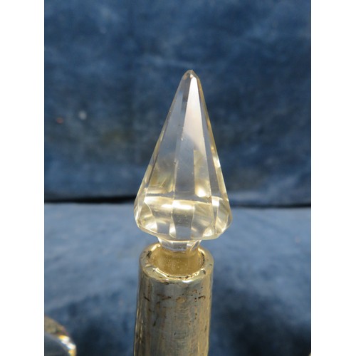 231 - A cut glass scent bottle of square section being 7 1/2