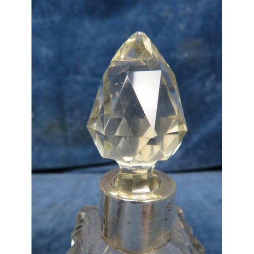 231 - A cut glass scent bottle of square section being 7 1/2