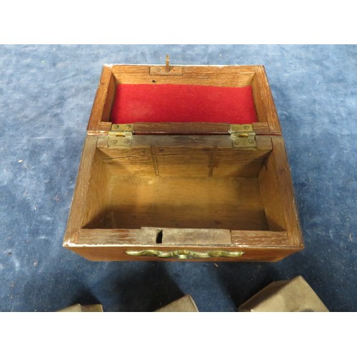 237 - A travelling writing set with 3 tin containers (one cap missing), in mahogany and brass box.