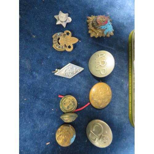 240 - A tin of buttons including A.R.P. and C.D., etc.,