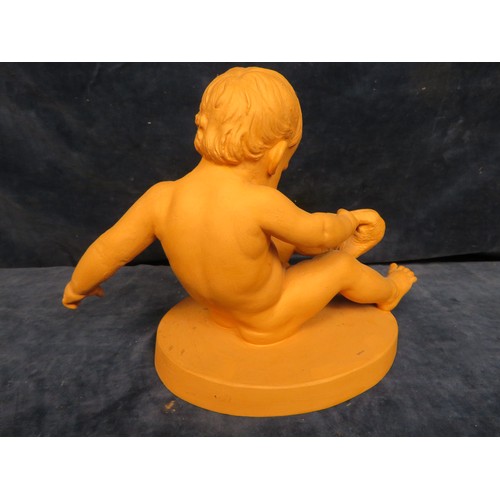 251 - A pottery figure of boy removing sock.