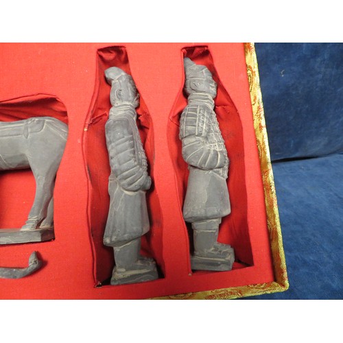 255 - A set of Oriental figures in presentation case.