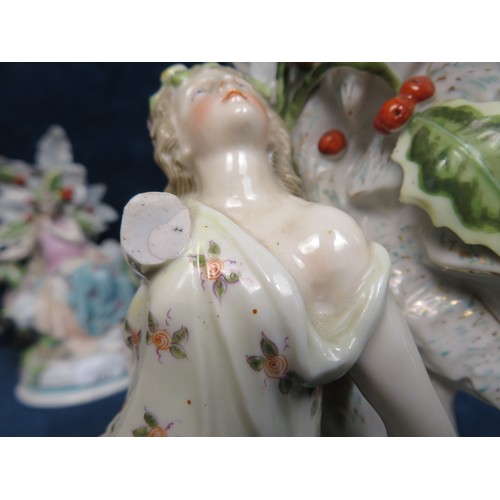 261 - A pair of Continental porcelain figures, both A/F, depicting 