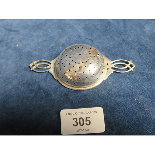 305 - A small pierced silver tea strainer hallmarked Sheffield 1920.