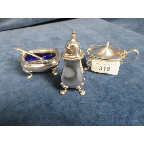 318 - A silver/plated condiment set comprising salt pot with blue glass liner, mustard pot (no glass liner... 