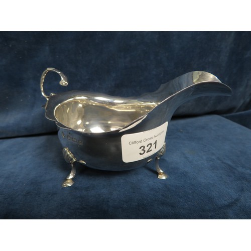 321 - A silver sauce boat on three splayed feet hallmarked Birmingham 1919 weighing approx. 2.5 troy oz.