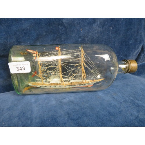 343 - A vintage glass bottle containing a 3 mast schooner, with wax sealed top - approx 26cm long