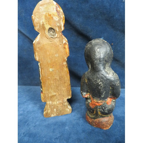 345 - A most unusual stoneware primitive style figurine depicting a seated figure in lion mask A/F and a m... 