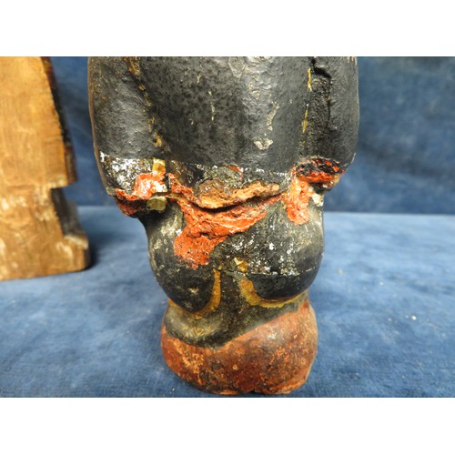 345 - A most unusual stoneware primitive style figurine depicting a seated figure in lion mask A/F and a m... 