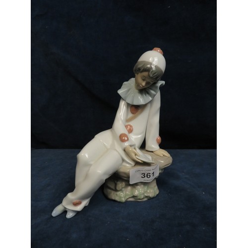 361 - A Lladro NAO figurine depicting 'Boy in Pierrot Costume'.