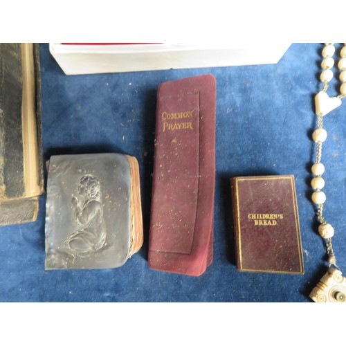 379 - A quantity of Religious items, prayer books, Bible and 