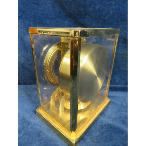 406 - A Le Coultre and Cie Swiss Atmospheric clock in brass case being 