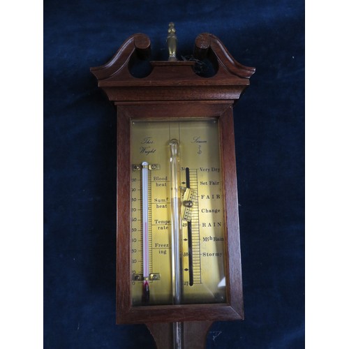 408 - A vintage stick barometer marked 