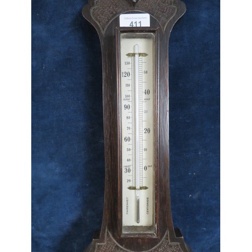 411 - A vintage banjo barometer in carved case - glass A/F.