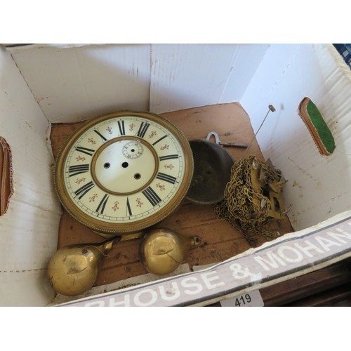 419 - A continental wall clock in a mahogany case A/F.