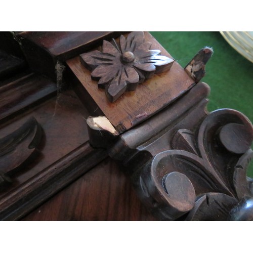 419 - A continental wall clock in a mahogany case A/F.