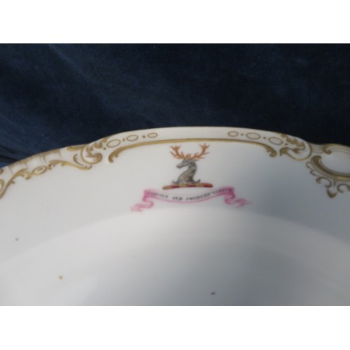 422 - Twelve dinner plates with gilt decoration and stag crest 