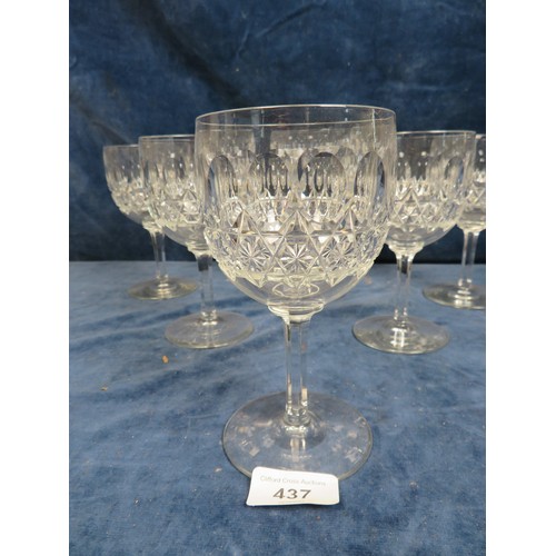 437 - A set of 6 cut glass pedestal wine glasses.