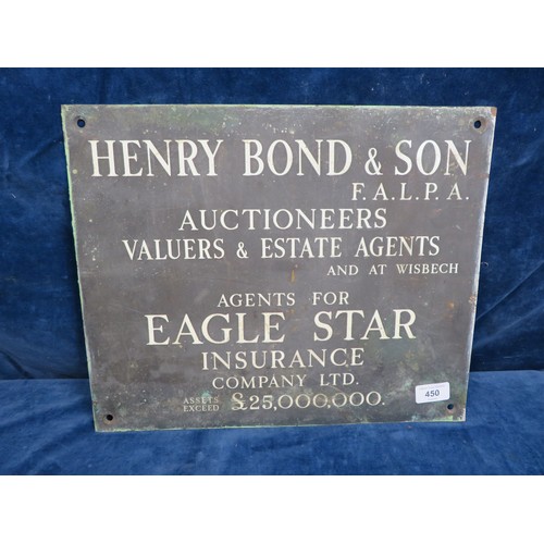 450 - A vintage brass wall plaque 