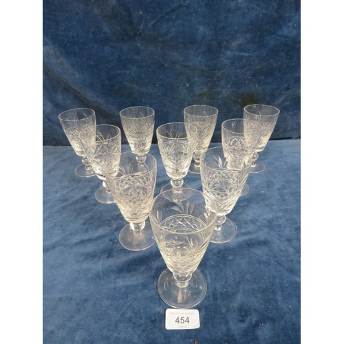 454 - A set of 10 cut glass wine glasses.