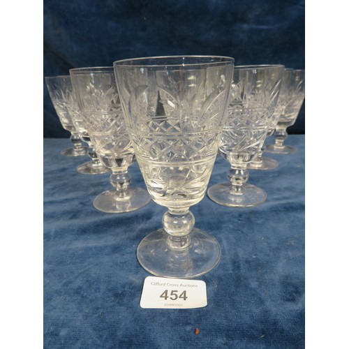 454 - A set of 10 cut glass wine glasses.