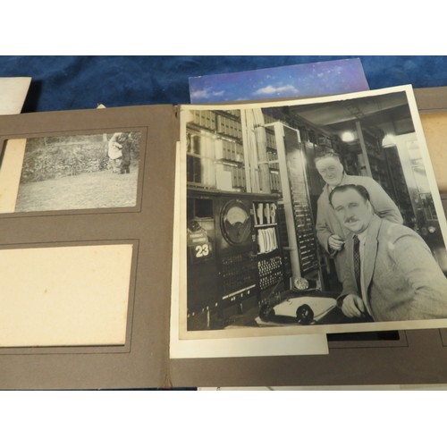 455 - A vintage photograph album with various vintage photographs .