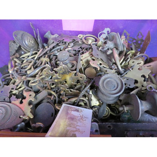 459 - A large quantity of brass handles, escutcheons, locks, etc.,