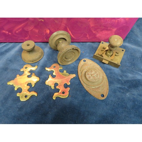 459 - A large quantity of brass handles, escutcheons, locks, etc.,