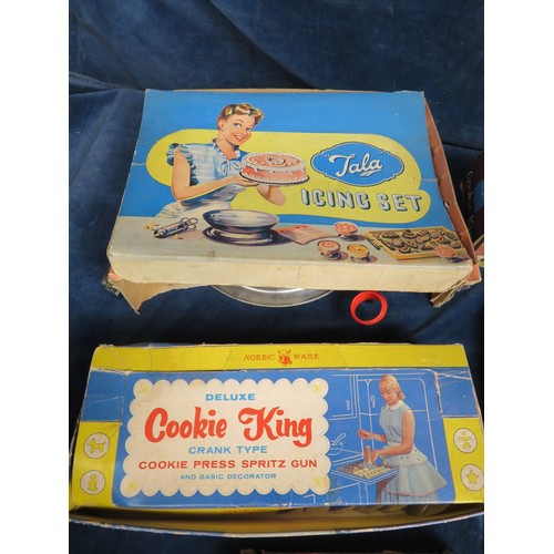 460 - Six vintage cooking items in original boxes.