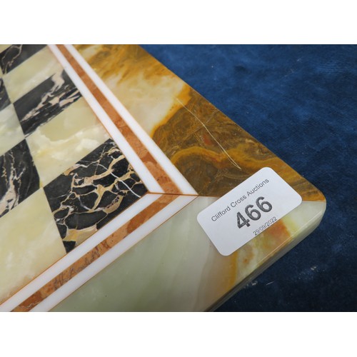 466 - An onyx and marble chess board.