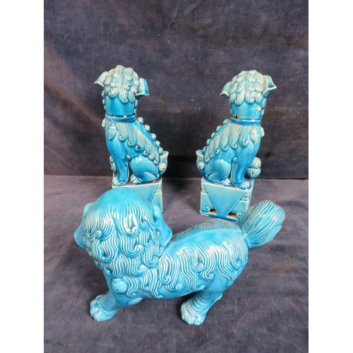 490 - Three blue glazed Oriental style Fu Dogs A/F.