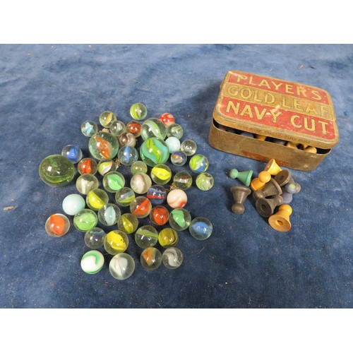 494 - A quantity of vintage marbles and game counters.