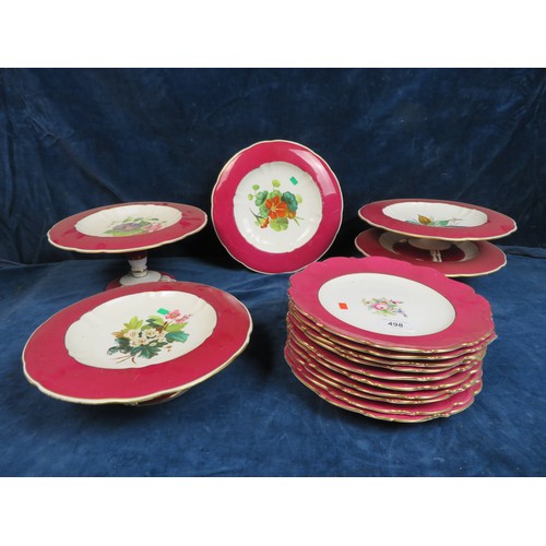 498 - A part dessert service with pink ground and hand-painted floral decoration comprising 5 comportes an... 