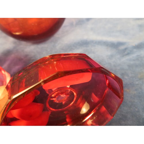 501 - Three pieces of Cranberry glass being jug, covered dish and 2-handled vase.