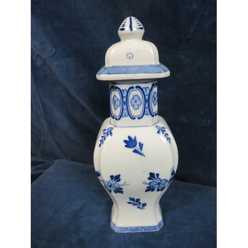 519 - A Delft ware lidded vase.