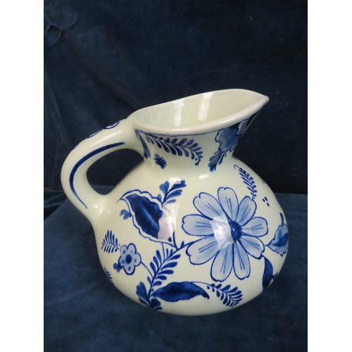 522 - A Delft Ware jug marked 